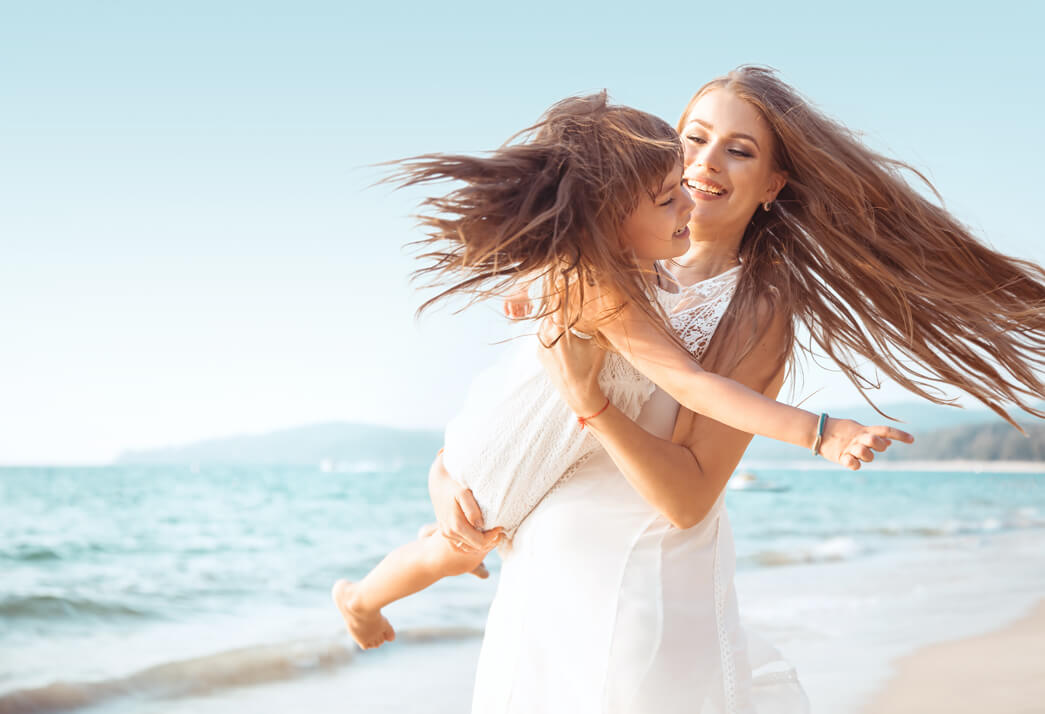 Mom and daughter with healthy natural hair